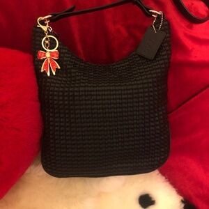 Just in SALE The SAK black braided leather small shoulder bag with red bow charm